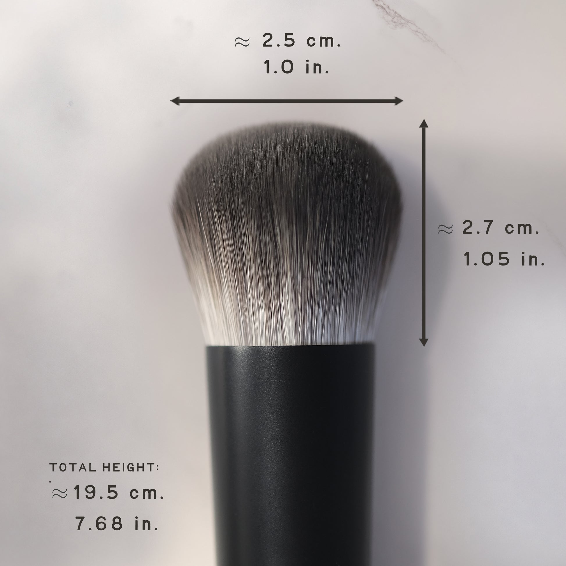 Makeup brush with measurements on a white background
